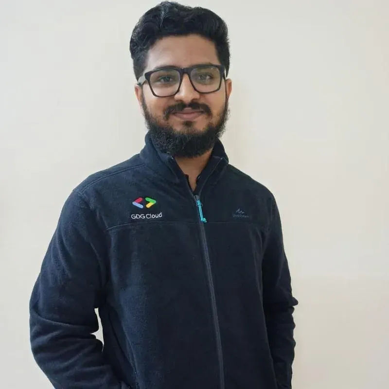 Nikunj wearing a GDG Cloud jacket